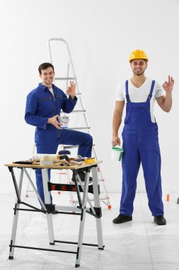 Workers renewing apartment   clipart