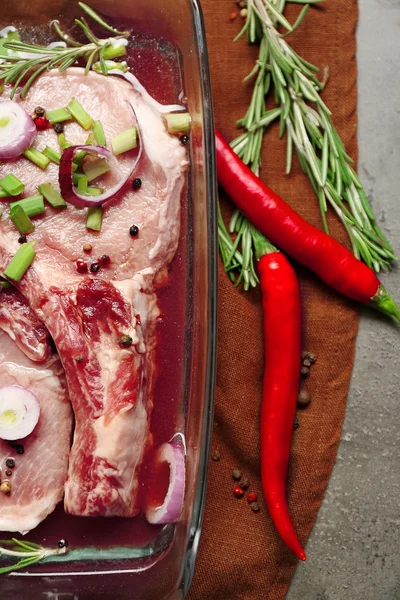 Marinating meat with spices — Stock Photo, Image