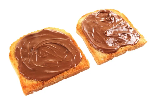 Chocolate poured on piece of bread isolated on white — Stock Photo, Image