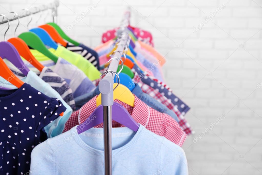 Children clothes on hangers