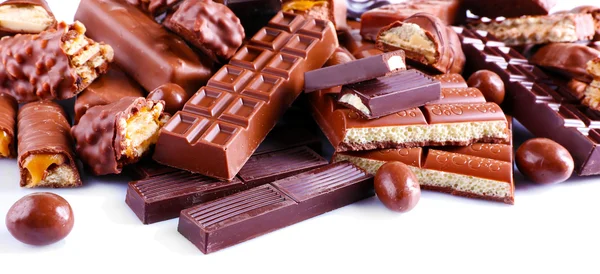 Mieszanką czekoladowe na stole, szczelnie-do góry — Zdjęcie stockowe