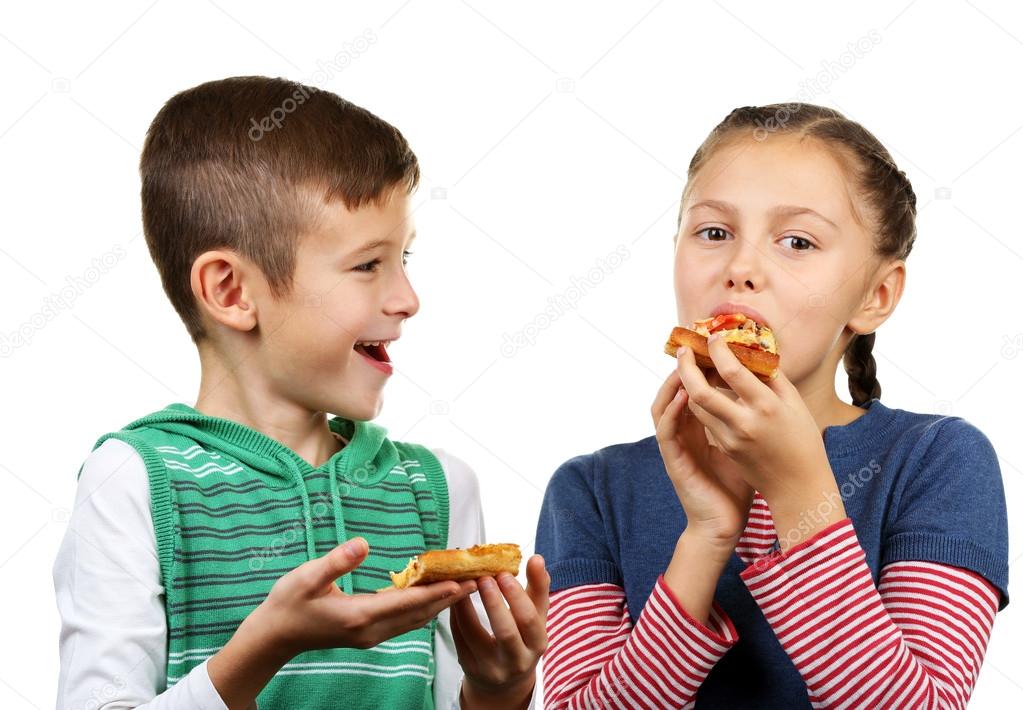 Children eating pizza isolated on white