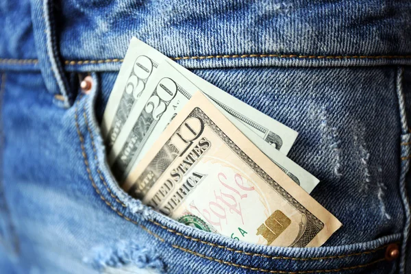美元钞票的牛仔裤 — 图库照片
