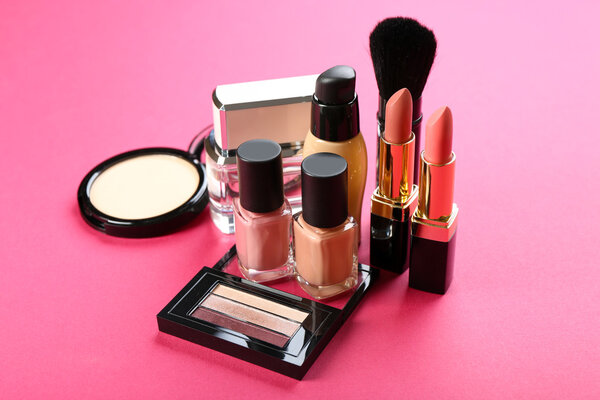 Cosmetics on pink background