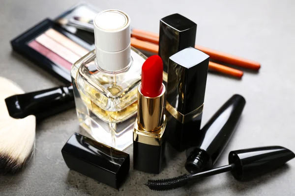 Cosmetics on dark background — Stock Photo, Image