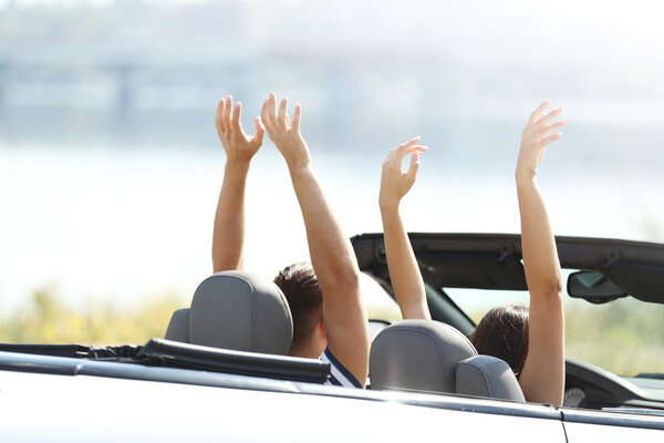 Couple in cabriolet car