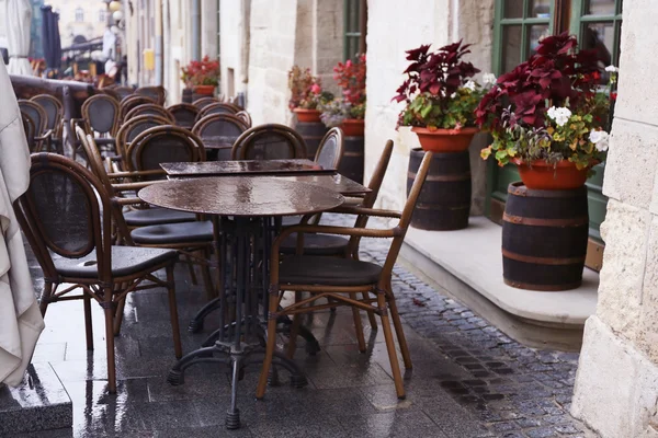 Street cafe after rain — Stock Photo, Image