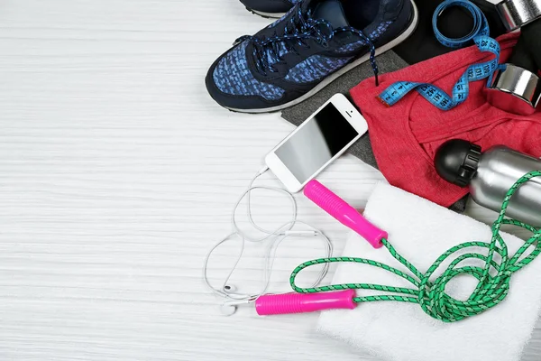 Conjunto para esportes e telefone inteligente — Fotografia de Stock