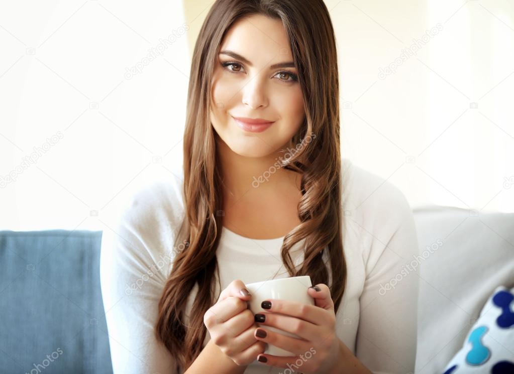 Beautiful woman  with cup of coffee