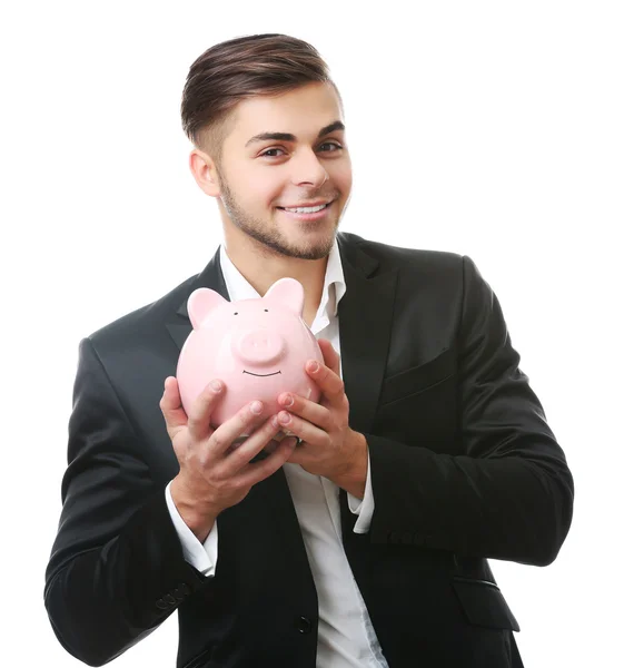 Uomo con scatola di soldi maiale isolato su bianco — Foto Stock