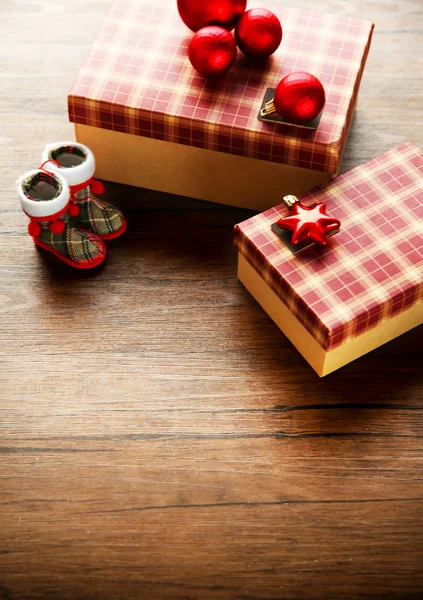 Box with Christmas toys on wooden background — Stock Photo, Image