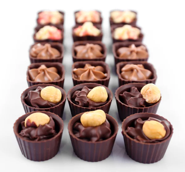 Chocolate sweets isolated on white — Stock Photo, Image