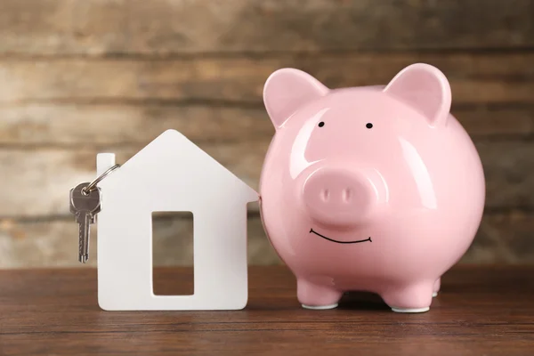 Pig money box and paper decor — Stock Photo, Image