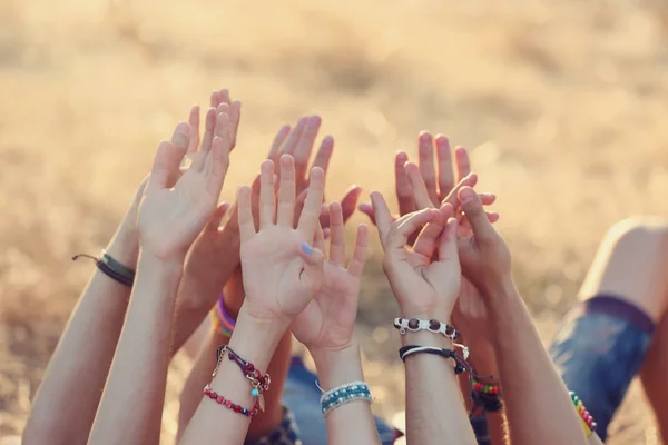 Friends hands raised up — Stock Photo, Image