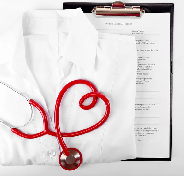 Red stethoscope, medical record — Stock Photo, Image