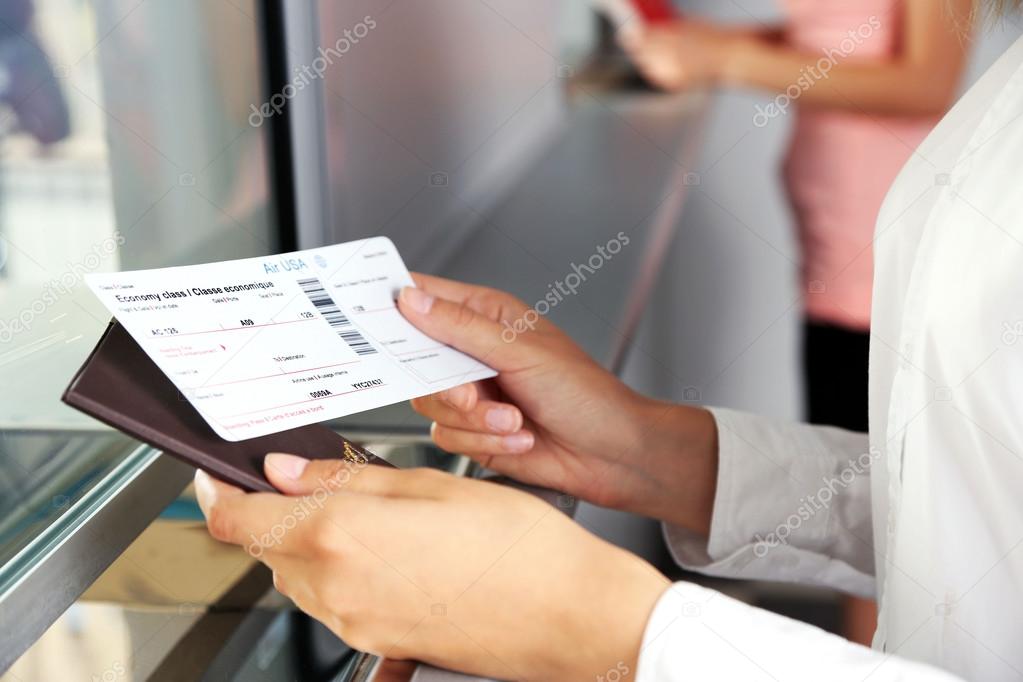 Woman buying tickets 