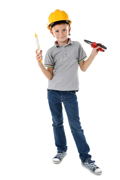 Boy in yellow helmet with building equipment — Stock Photo, Image