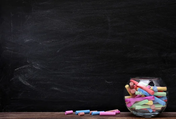 Multicoloured chalk in aquarium — Stock Photo, Image