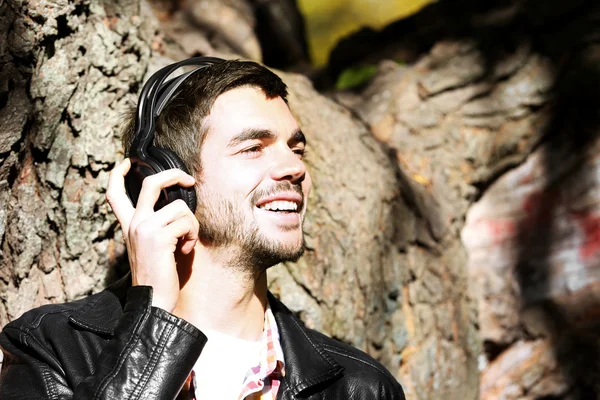 Young man in headphones — Stock Photo, Image