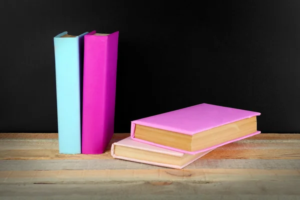 Books on a table on background — Stock Photo, Image