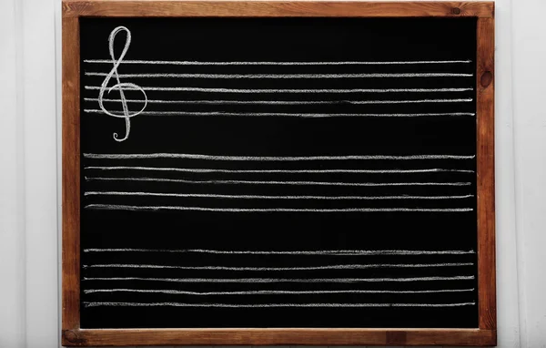 Quadro negro forrado para notas musicais — Fotografia de Stock
