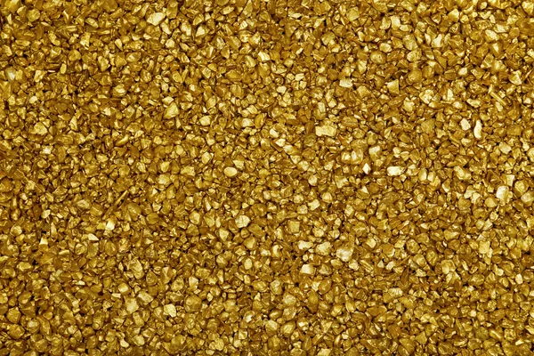 Ouro nugget grãos fundo, close-up — Fotografia de Stock