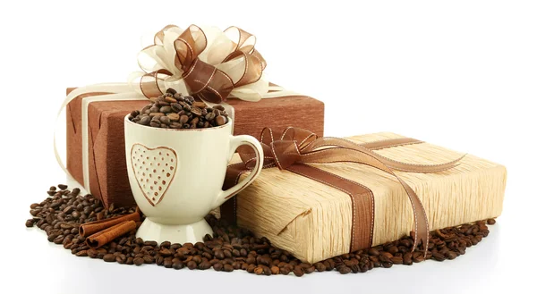 Beautiful gifts with bows and coffee grains isolated on white — Stock Photo, Image