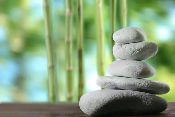 Spa stones on table — Stock Photo, Image