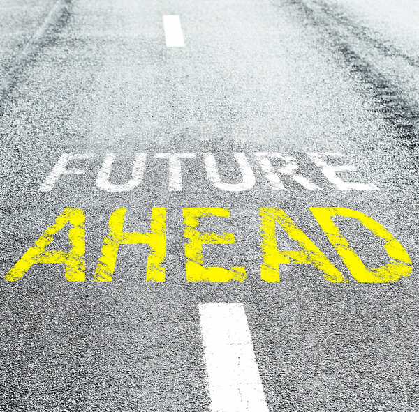 Future ahead written on road