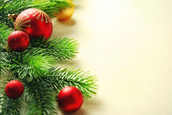 Christmas fir tree branches with toys — Stock Photo, Image