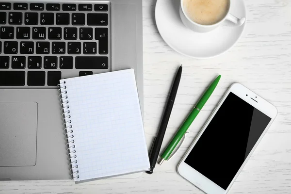 Empty  notebook on laptop keyboard — Stock Photo, Image