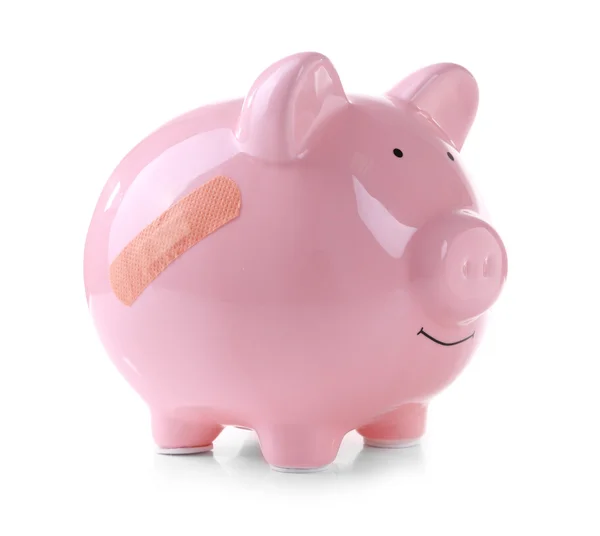 Piggy Bank met zelfklevende pleister, geïsoleerd op wit — Stockfoto