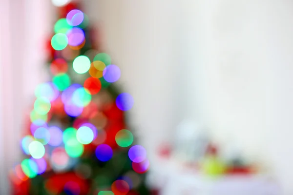 Luces de Navidad en el árbol de Navidad de fondo abstracto — Foto de Stock