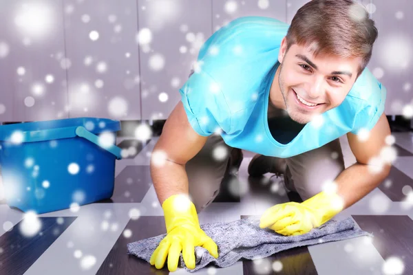 Young man cleaning floor — Stock Photo, Image