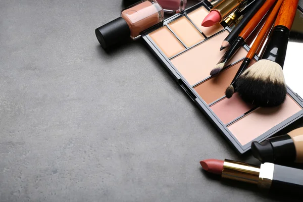 Cosmetics on dark background — Stock Photo, Image