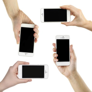 Akıllı telefonlar üzerinde beyaz izole, holding eller