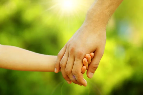 Hands of father and son — Stock Photo, Image