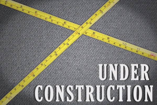 Szöveg Under construction — Stock Fotó