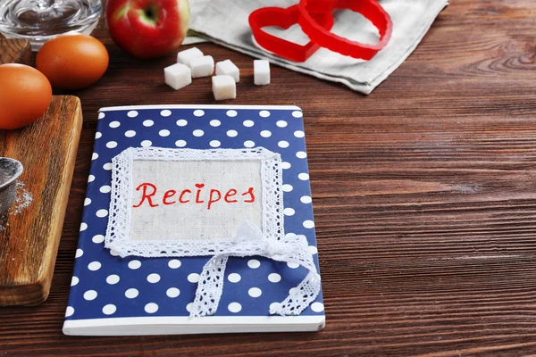 Recipe book and ingredients — Stock Photo, Image