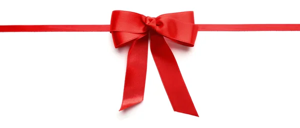 Shiny red ribbon with bow isolated on white — Stock Photo, Image