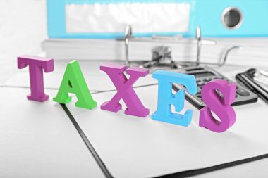 Alfabe vergi hesap makinesi ile