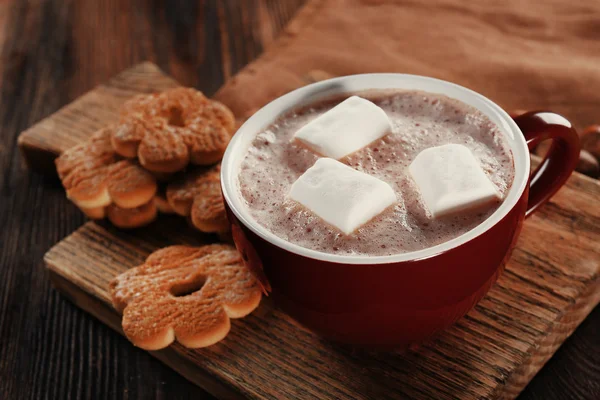 Cup of hot cacao with cookies and nuts — Stock Photo, Image