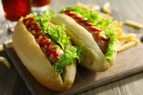 Delicious hot-dogs with French fries — Stock Photo, Image