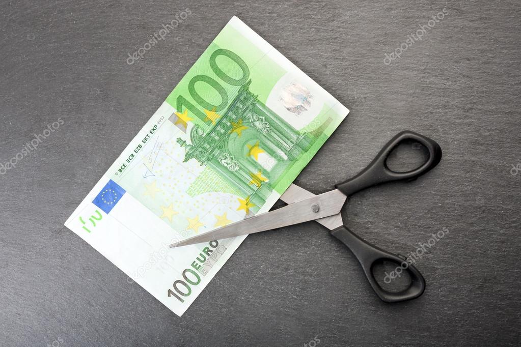 scissors cut money