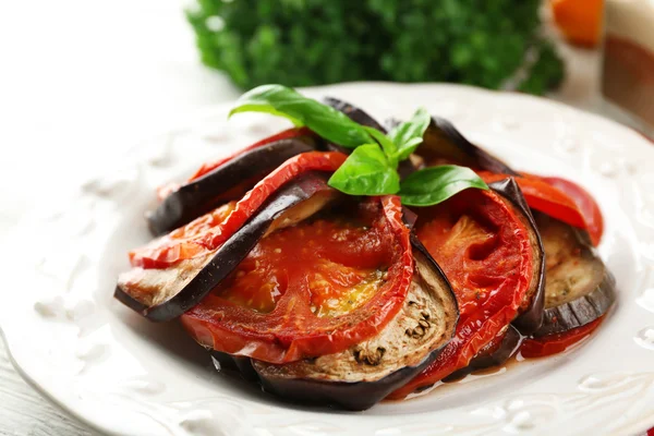 Ratatouille on plate, on table background — Stock Photo, Image