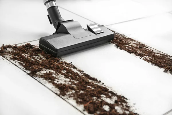 Carpet sweeper and dust — Stock Photo, Image