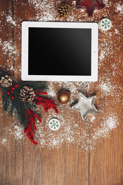 Tablet and Christmas decor — Stock Photo, Image