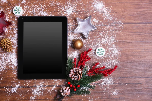 Tablet and Christmas decor — Stock Photo, Image