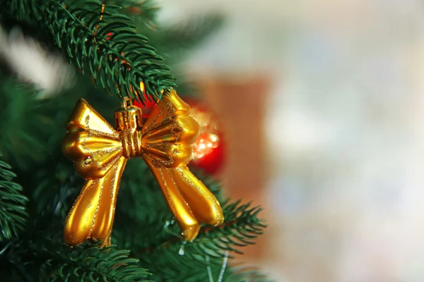 Christmas toy on a fir tree — Stock Photo, Image