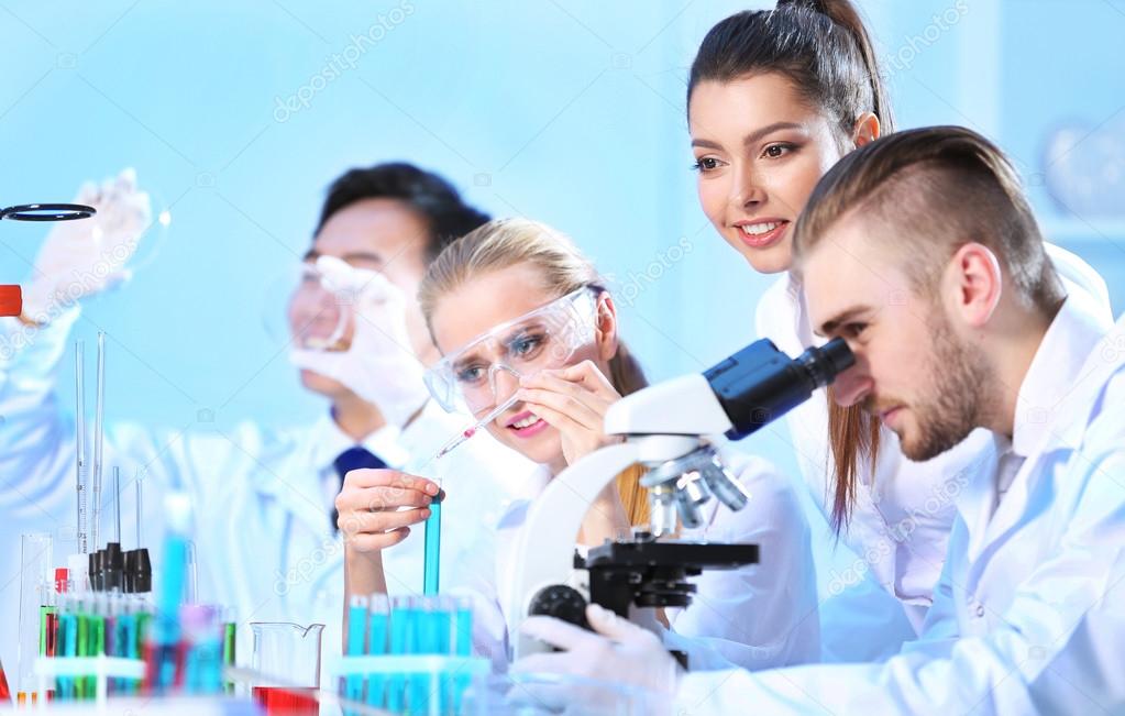 Medical technicians working in laboratory